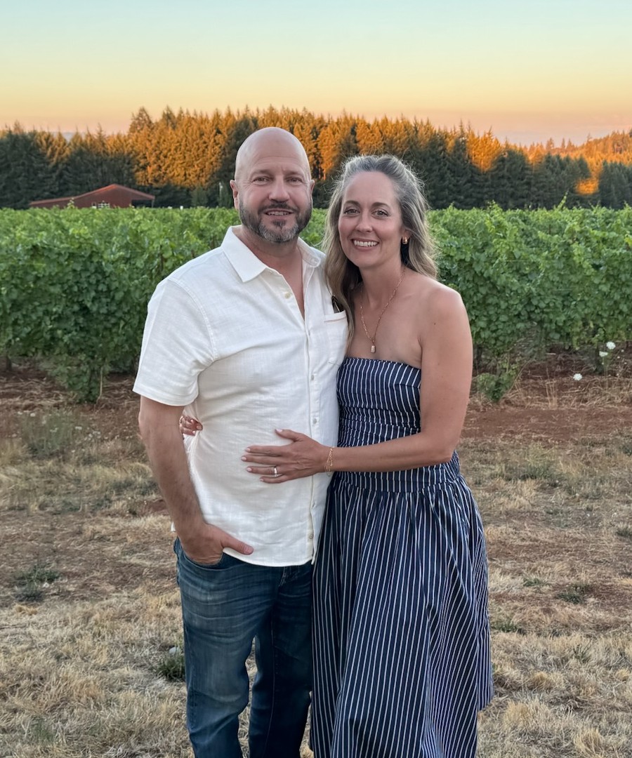 Ken and Tamara Wytsma in a Willamette Valley vineyard at sunset